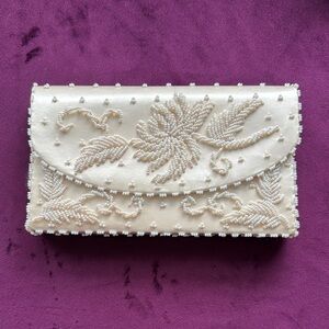 Cream Floral hand Beaded Clutch with Scalloped Trim. Hand beaded in Hongkong